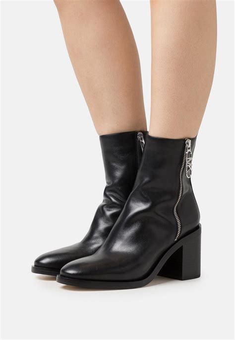 michael michael kors regan leather boot|Michael Kors ankle boots sale.